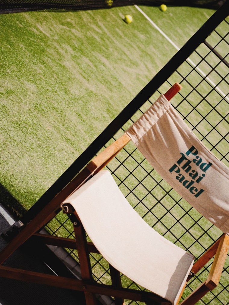 Court-side seating in afternoon light